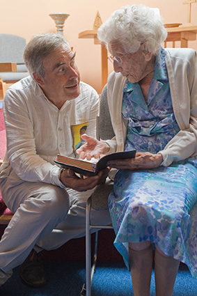 Prof Alan Rice talks to Eunice Byers about the bible she received from an American GI in 1943